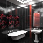 ห้องน้ำสีดำและสีขาวที่มีองค์ประกอบสีแดง