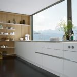 White kitchen design on a panoramic window background