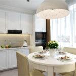 Design of a white kitchen with combined lighting