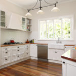 White kitchen design in a summer cottage interior