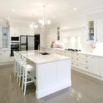 White kitchen design in a glossy interior
