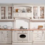 White kitchen design in antique interior