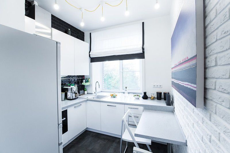 Loft style white kitchen interior