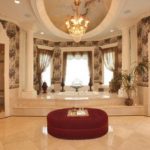 Large marble bathroom with Jacuzzi and daybed