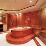 Large bathroom tiles in red marble