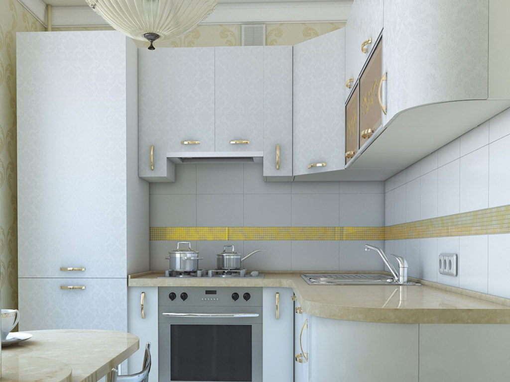 Fehér hűtőszekrény, egy világos konyha belsejében