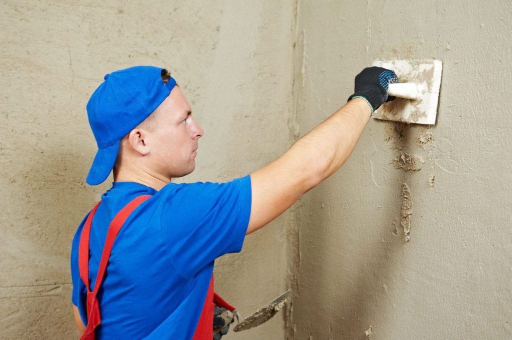 Mosaic in the bathroom; stucco and wall putty