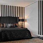 The decoration of the walls in the bedroom vertical stripes