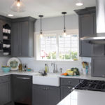 Gray palette kitchen set with white ceiling and countertops