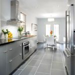Gray kitchen palette with white dining area