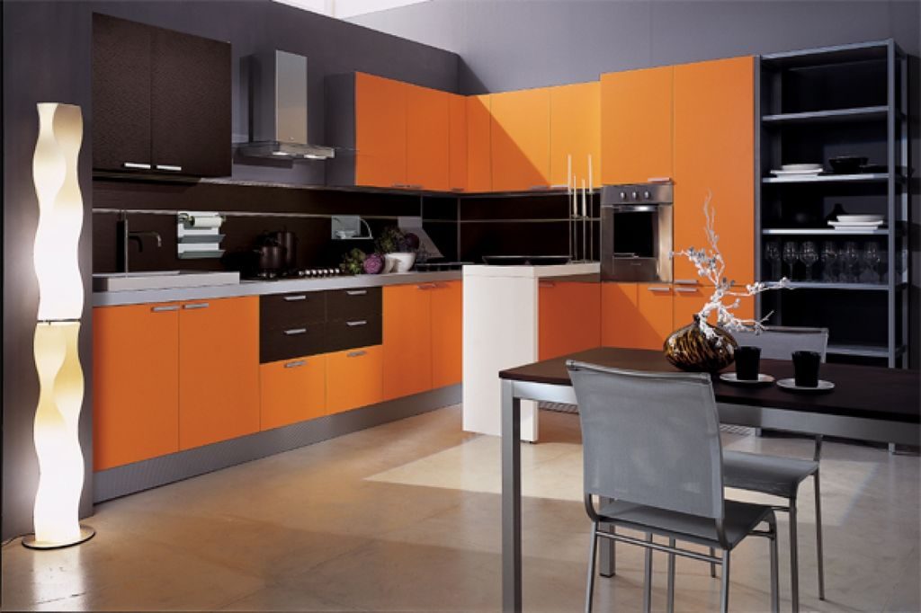 A gray kitchen palette combined with an orange