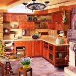 Kökdesign i ett privat hus med en rustik spis