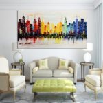 The paintings in the living room interior are contrasting bright colors.