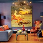 The paintings in the interior of the living room are many horses.