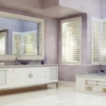 the idea of ​​using light decorative plaster in the interior of the bathroom picture