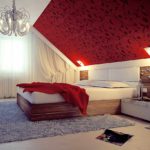 example of an unusual interior of a bedroom in the attic photo