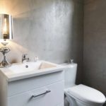 application of bright decorative plaster in the interior of the bathroom photo