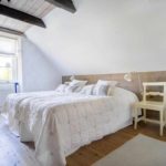 example of a bright interior of a bedroom in the attic picture