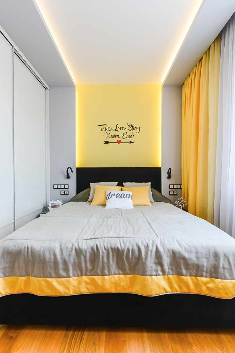 An example of a bright interior of a narrow bedroom