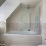 idea of ​​a beautiful bathroom interior with corner bath picture