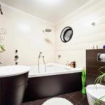 idea of ​​unusual interior of a bathroom with a corner bath picture