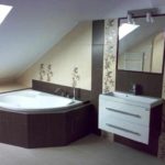 An example of an unusual style of a bathroom with a corner bathtub photo