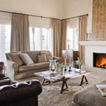 idea of ​​using an unusual interior of a living room with a fireplace photo