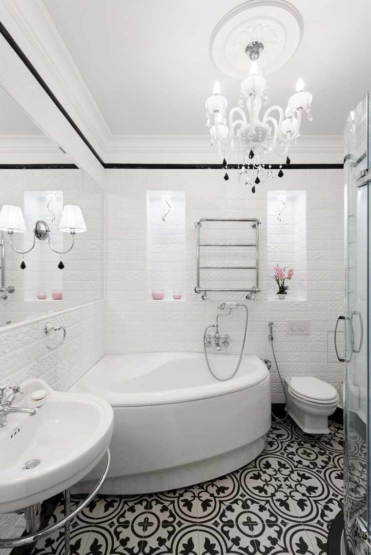idea of ​​a light bathroom decor with corner bath