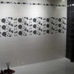 An example of an unusual style of a bathroom with tiling photo