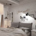 Balta ķieģeļu siena guļamistabas interjerā