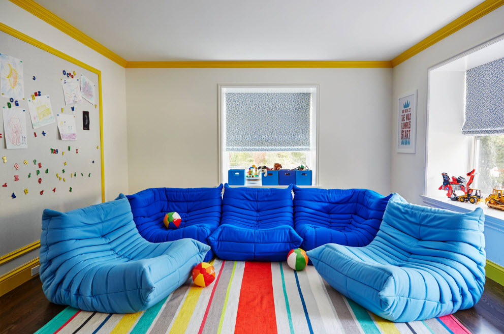 Blue frameless chairs in the boys room