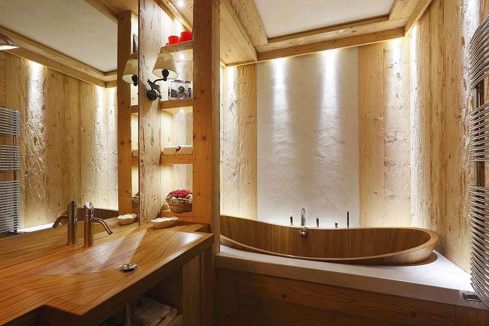 Natural wood in the interior of a fashionable bathroom