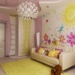 Wall mural with large flowers on a nursery wall
