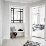 Window in the white hallway of a private house