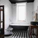 Black color in the design of the sanitary unit of a private house
