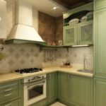 Green Provence style kitchen
