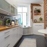 Red brick in the design of a modern kitchen