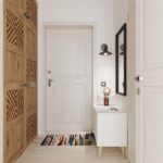 Wardrobe with wooden doors in a white corridor