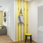 Yellow stripes on the hallway wall