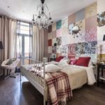Rustic bedroom with patchwork wallpaper.