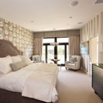 Design a spacious bedroom with gray wallpaper