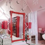 Red frame mirror and crystal pendants on chandeliers