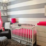 Striped wallpaper in a newborn's room