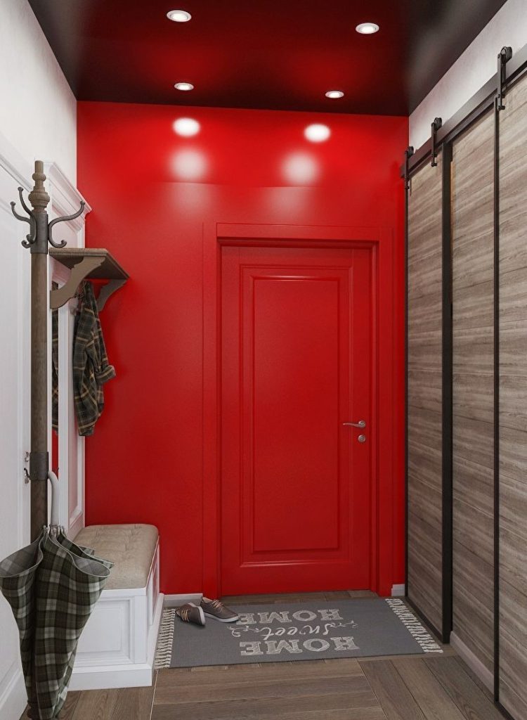 Red wall in a small hallway