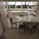 Keuken op het balkon om ruimte te besparen in een klein appartement