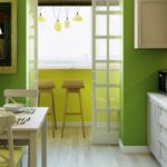 Køkken i grønt med en fornyet balkon