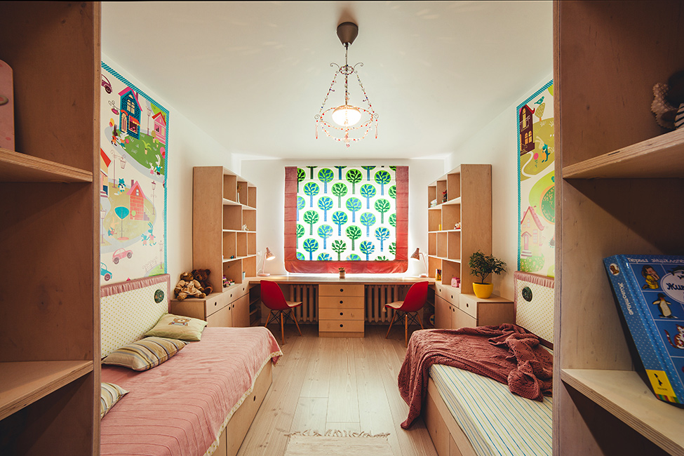 Symmetrical interior of a room for two daughters