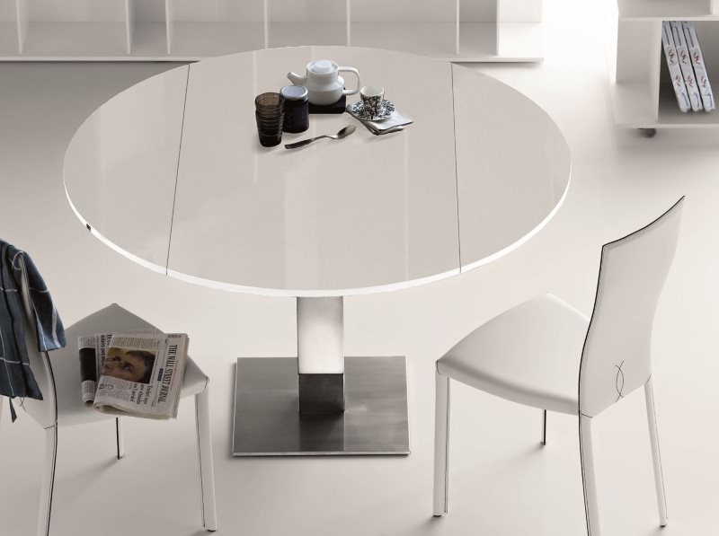 Minimalist white folding dining table in the kitchen