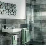 Stylish design of the bathroom with unusual tiles
