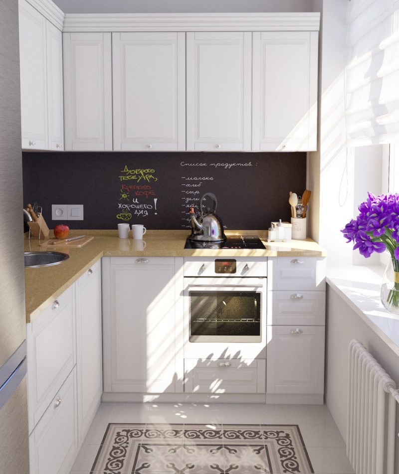 Keramiskt golv i köket med en vit uppsättning